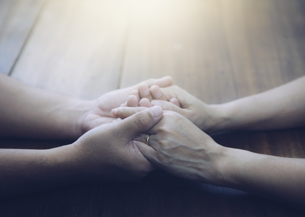 Couple Praying Together single people tried of hearing