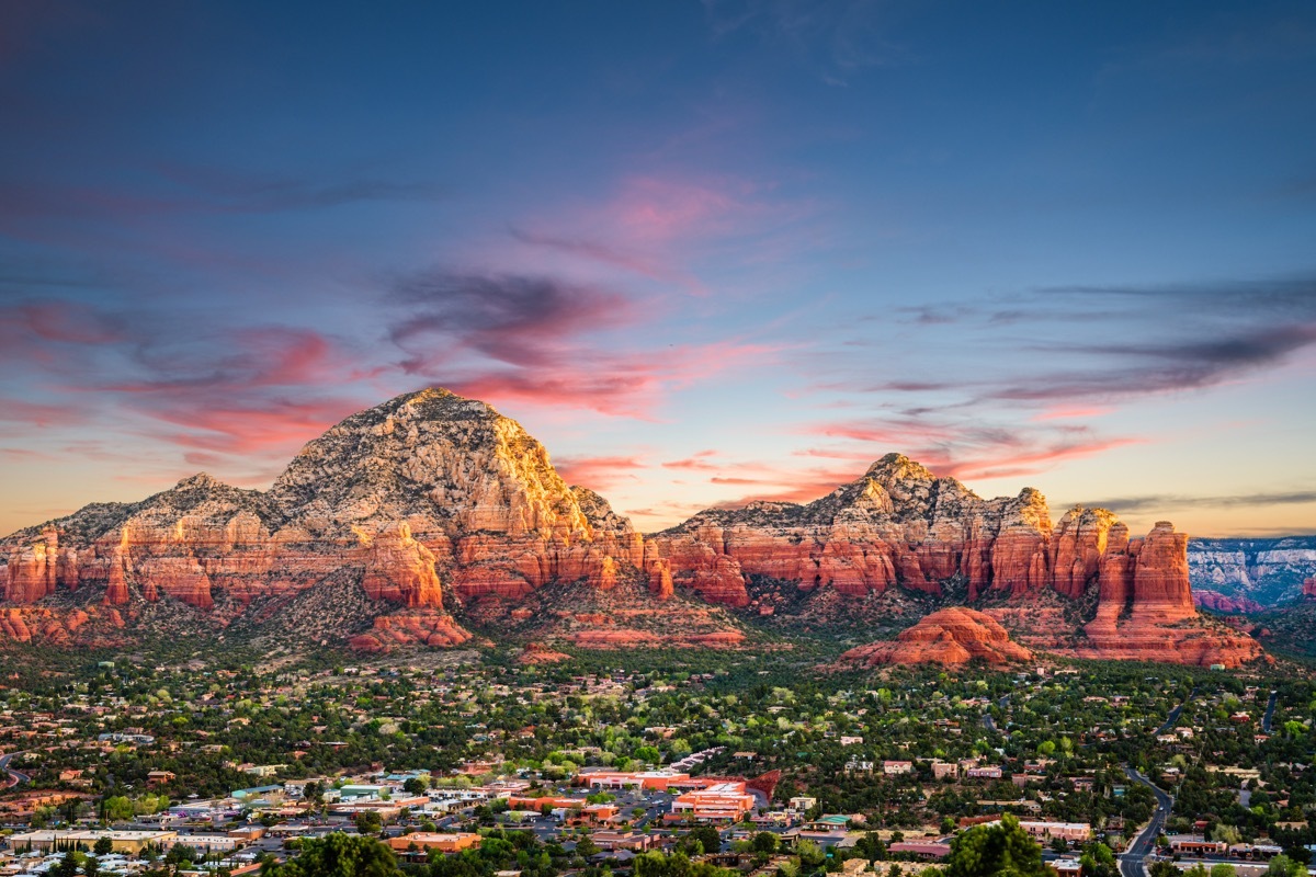 Sedona, Arizona, USA downtown and mountains.