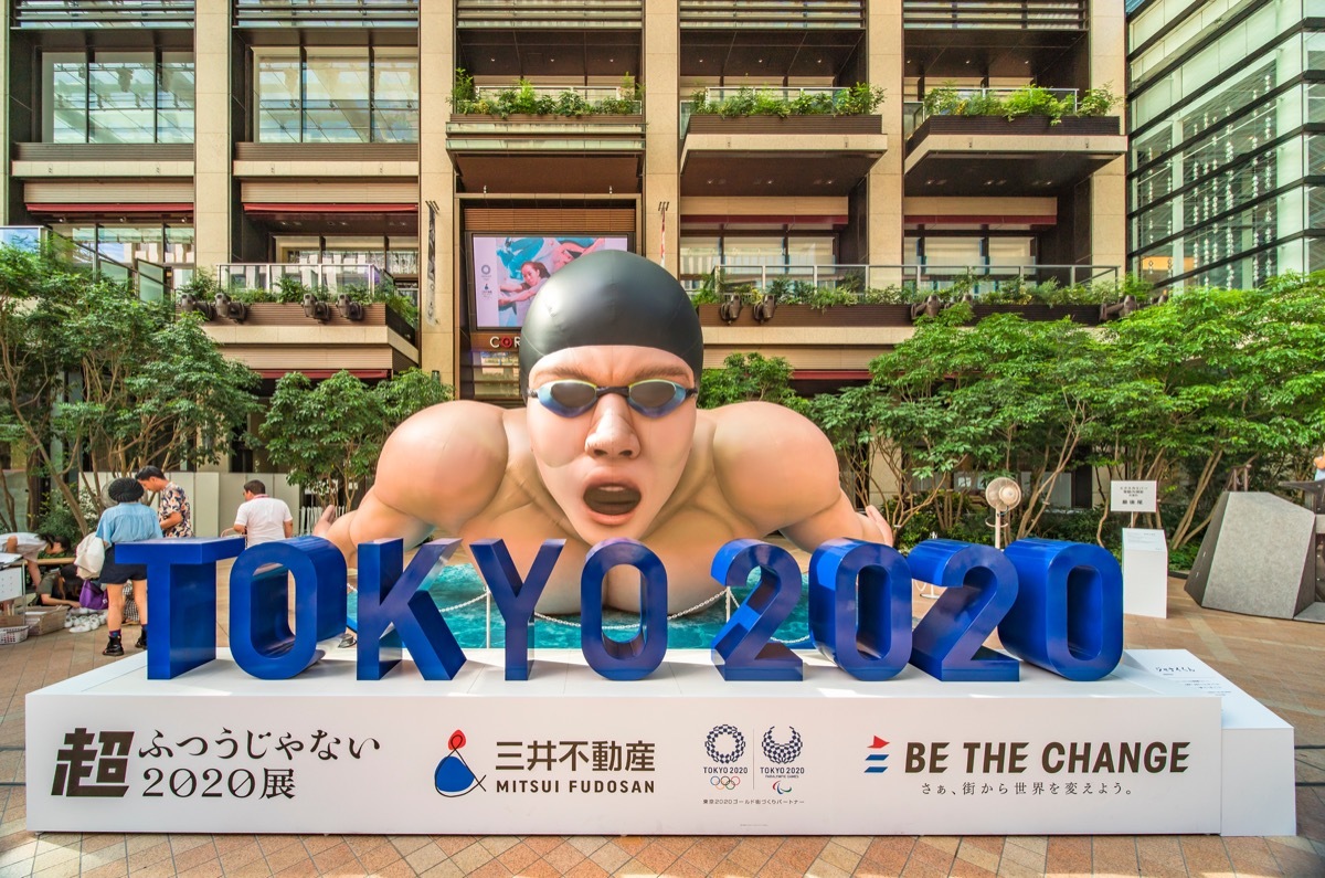 Huge inflatable structure in the shape of a swimming athlete in action