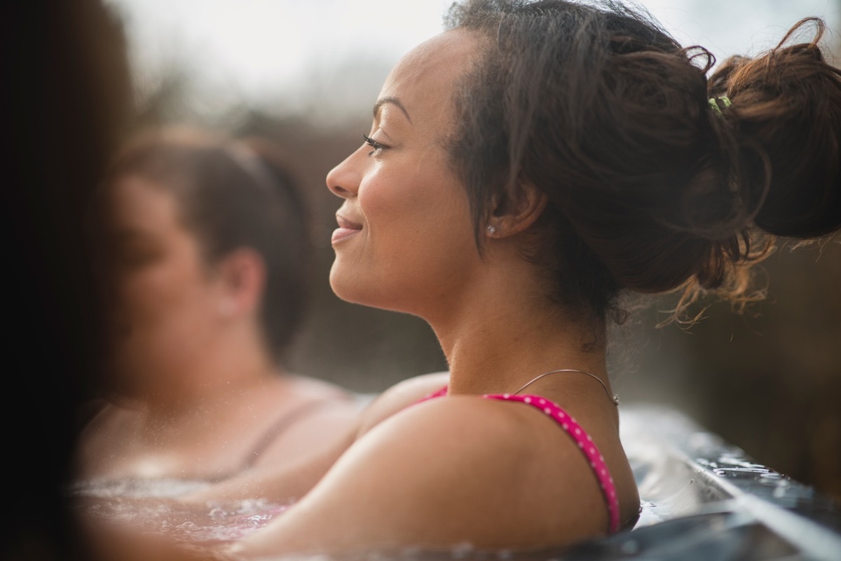 woman sitting in hot tub