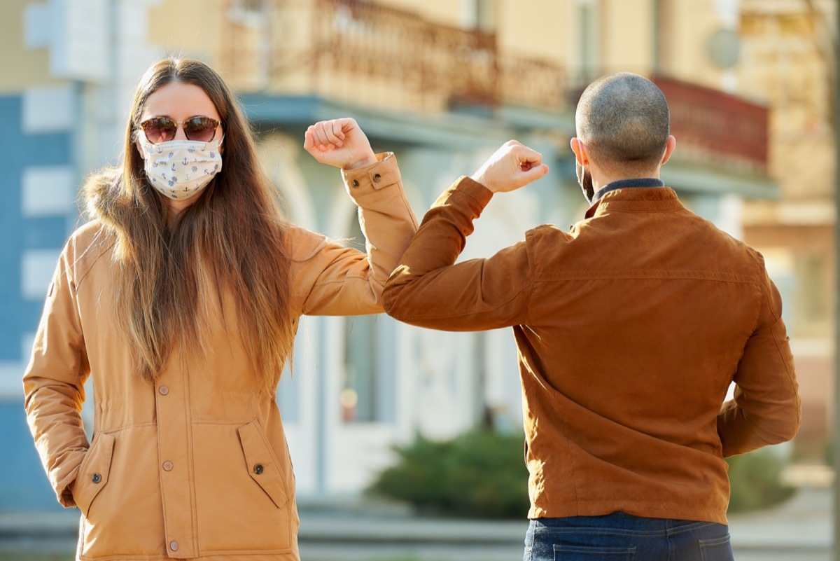 Elbow greeting to avoid the spread of coronavirus