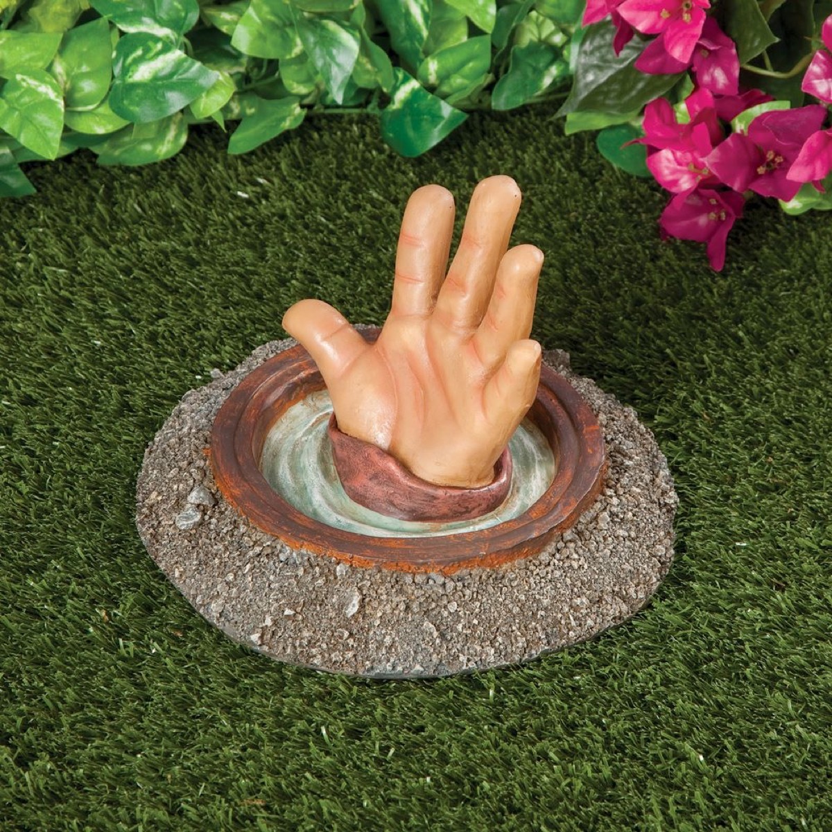 Hand Stuck in Manhole {Ugly Lawn Decorations}