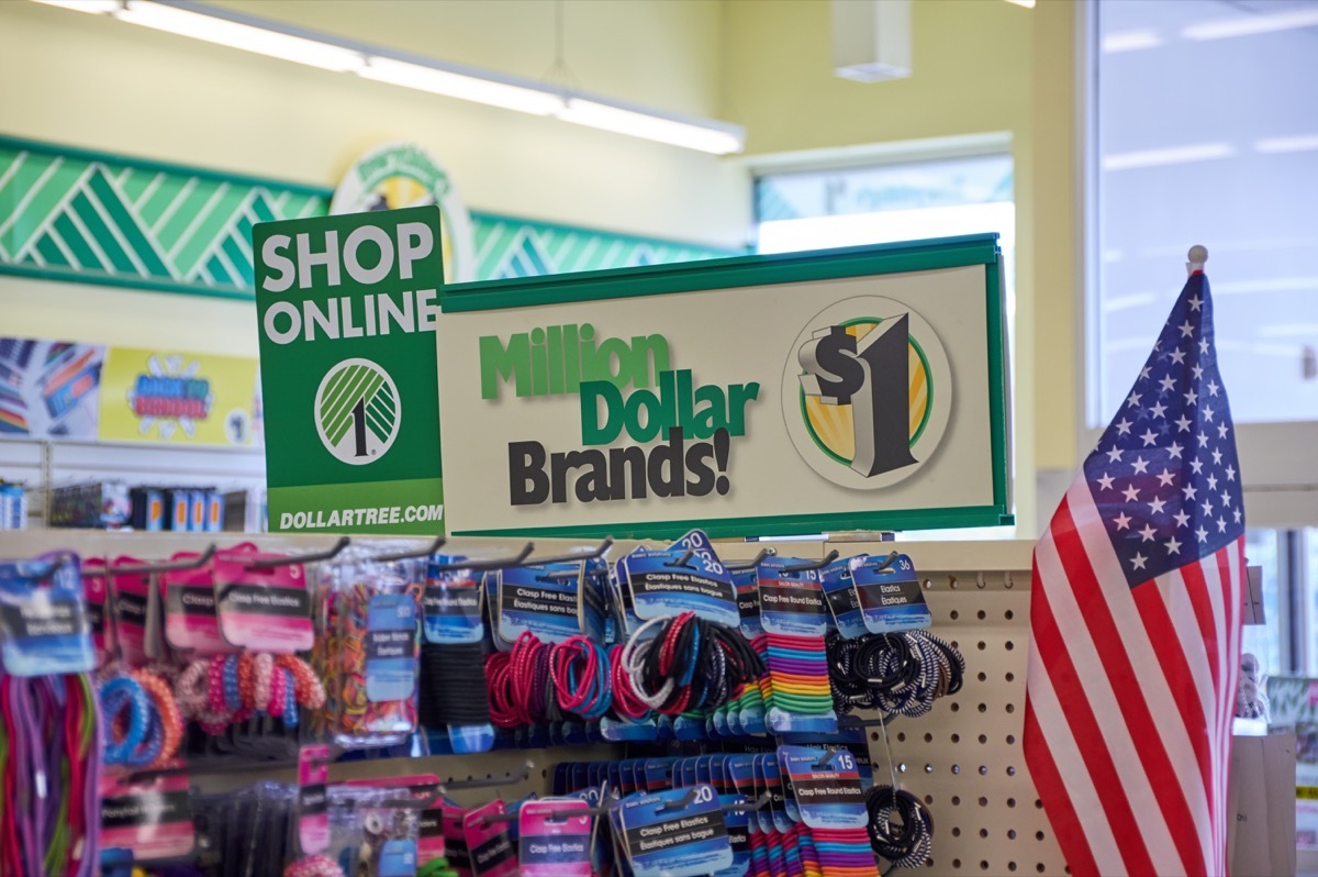 PLATTSBURGH, USA - AUGUST 23, 2017 : Dollar Tree shop online signage. with american flag. Dollar Tree, Inc. is an American chain of discount variety stores that sells items for one dollar or less.