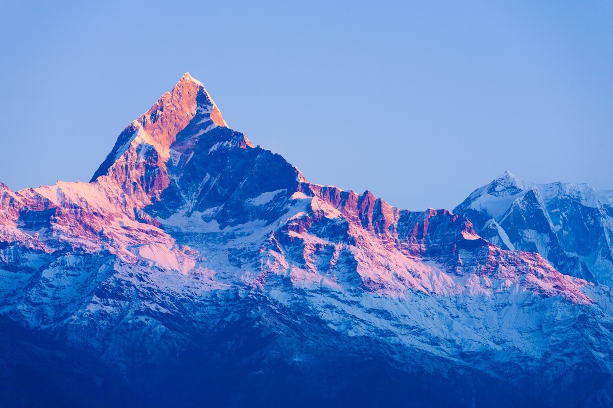 colorful glow on snowy mountain