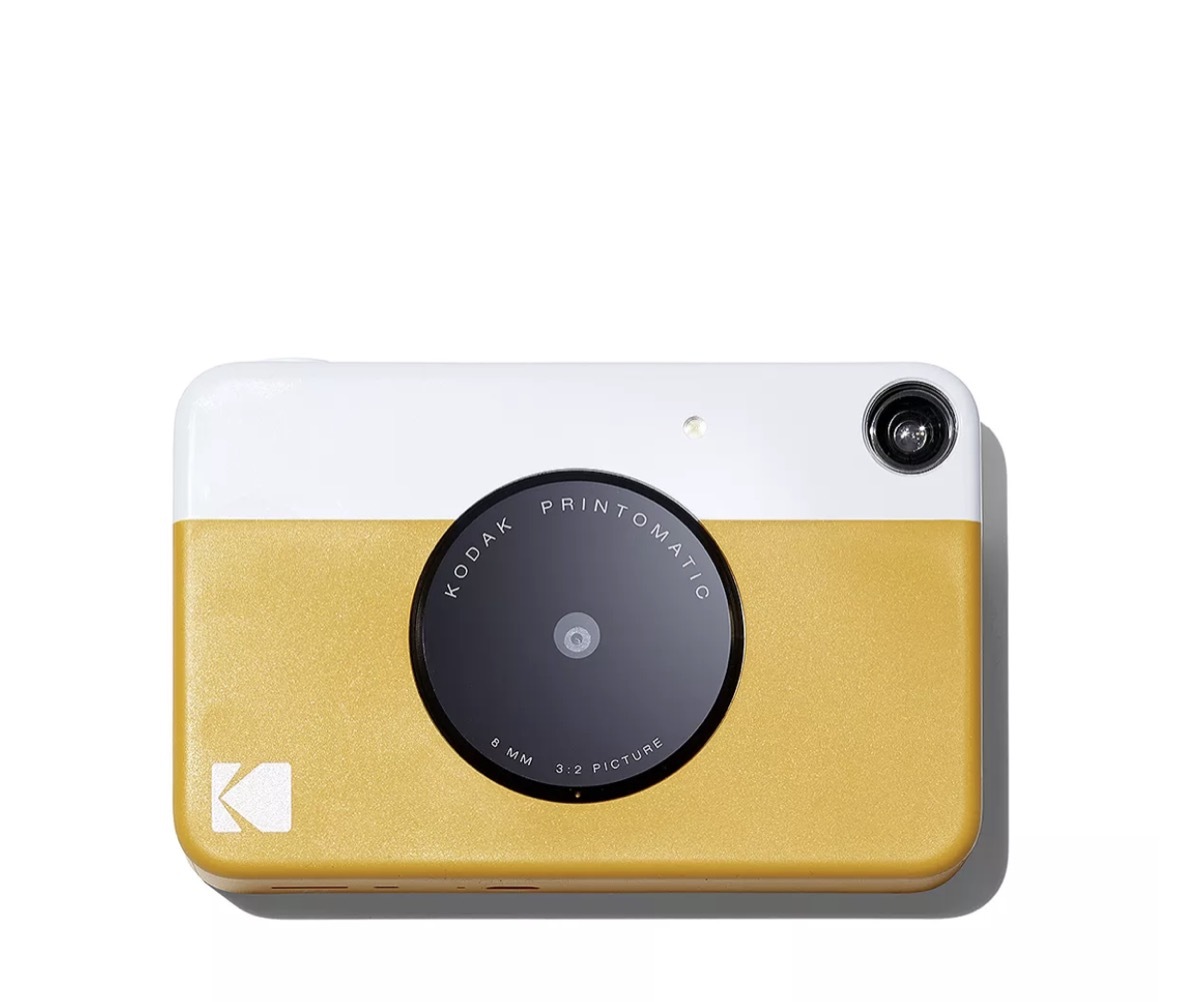 kodak printomatic instant print camera in yellow and white