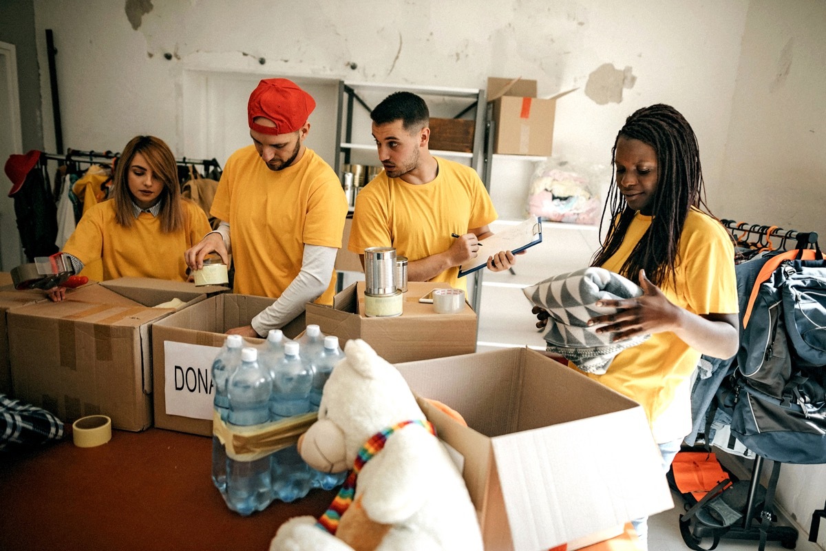 homeless shelter workers packing boxes