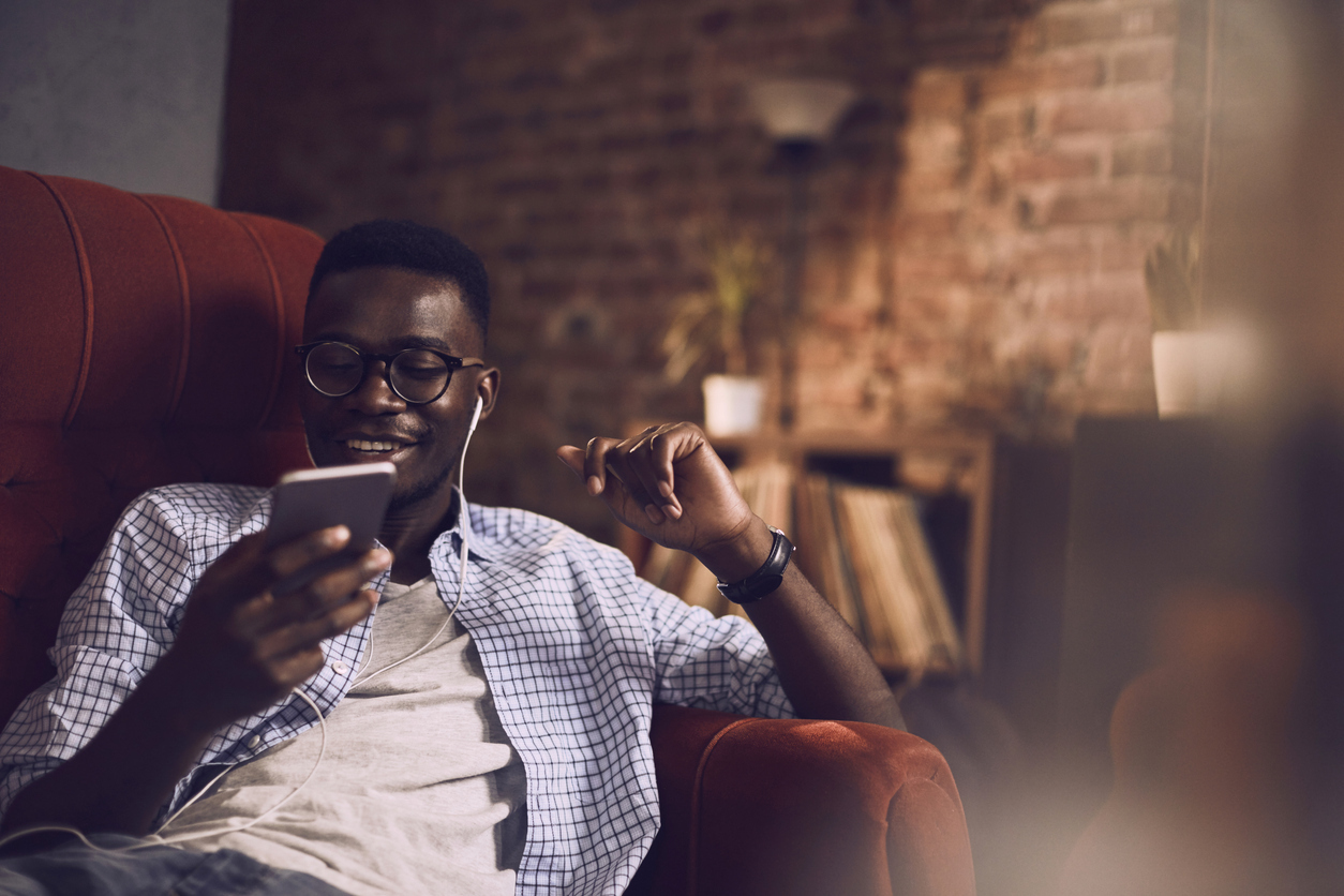 young man listening to music