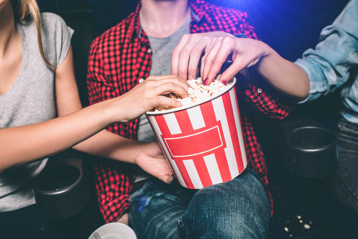 people eating popcorn