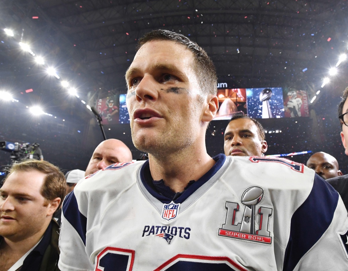  New England Patriots quarterback Tom Brady stands on the field after Super Bowl LI at NRG Stadium in Houston on Feb. 5, 2017.