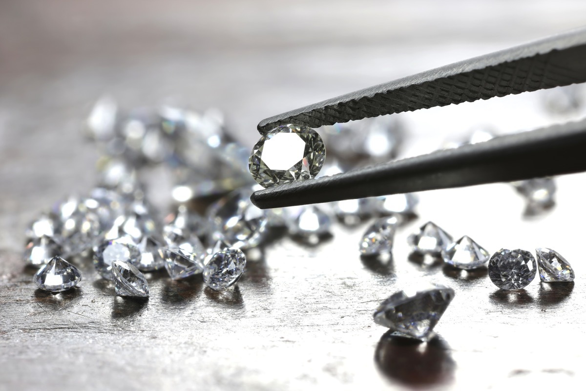 diamond held by tweezers