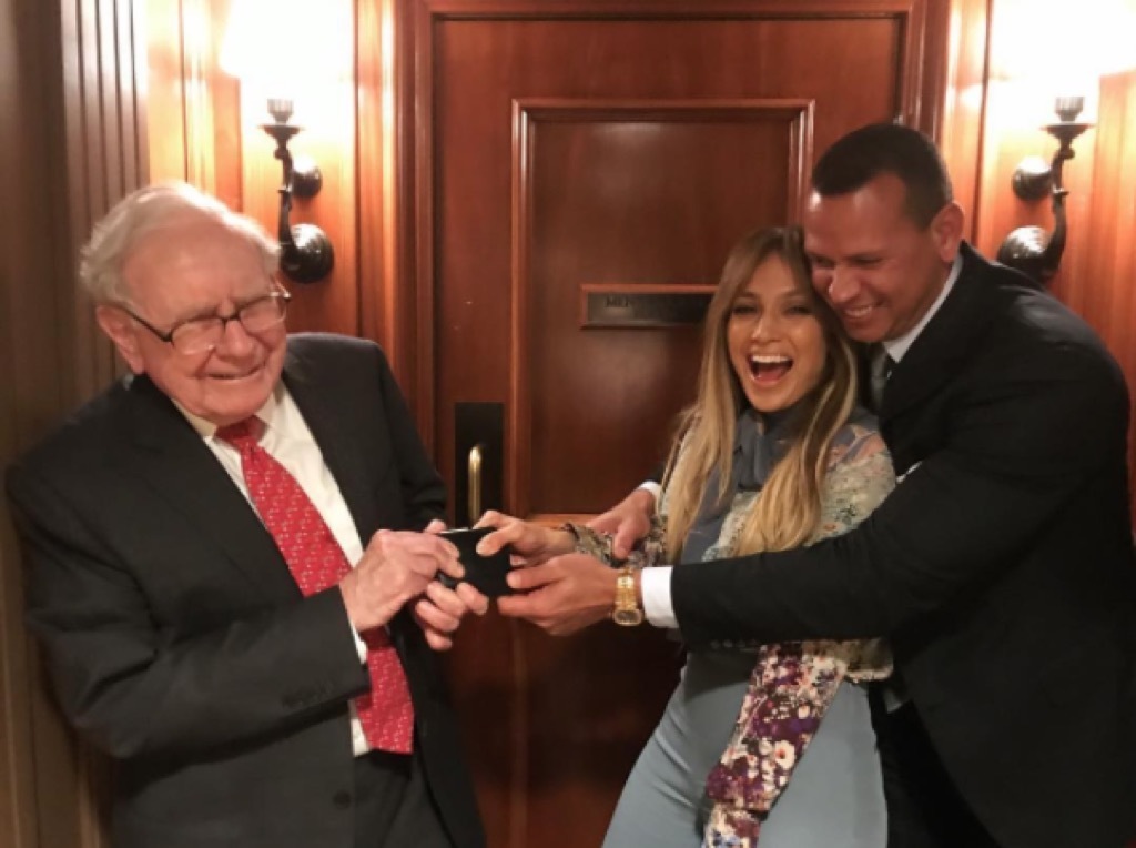 Jennifer Lopez and Alex Rodriguez with Warren Buffett.