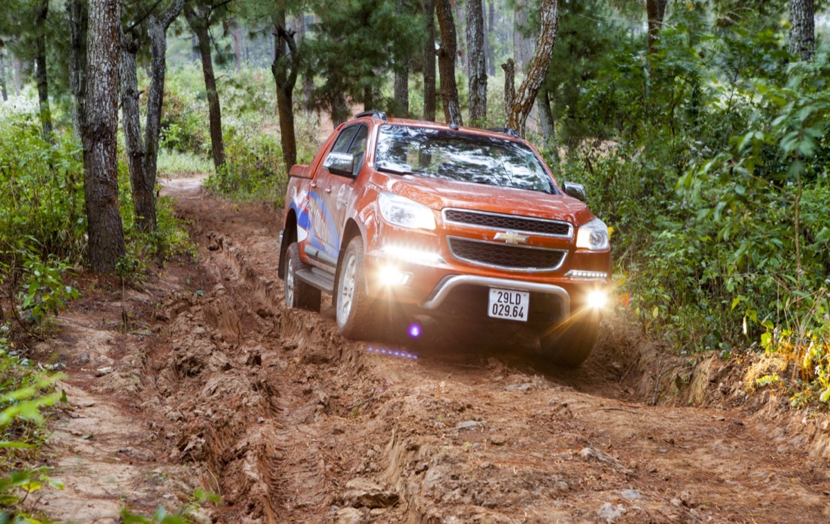 a red Chevrolet Colorado pickup truck