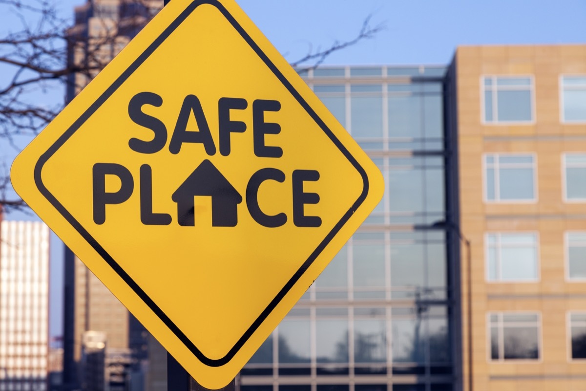 safe place sign city background