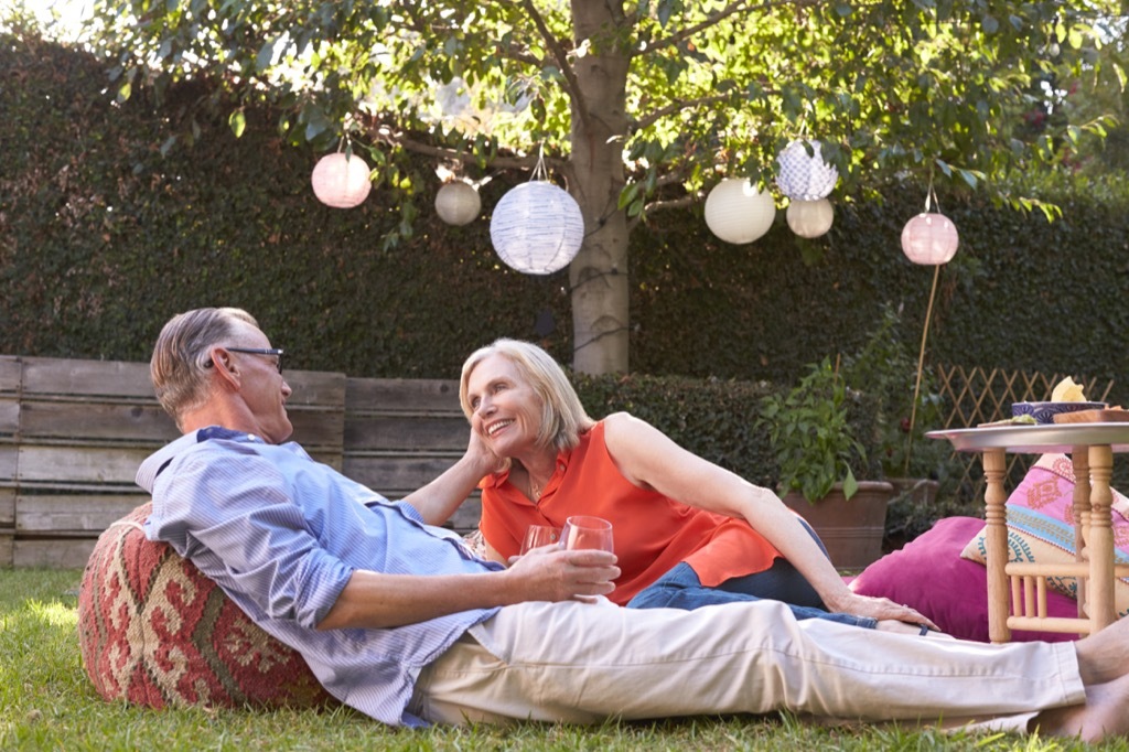 couple having picnic outside party