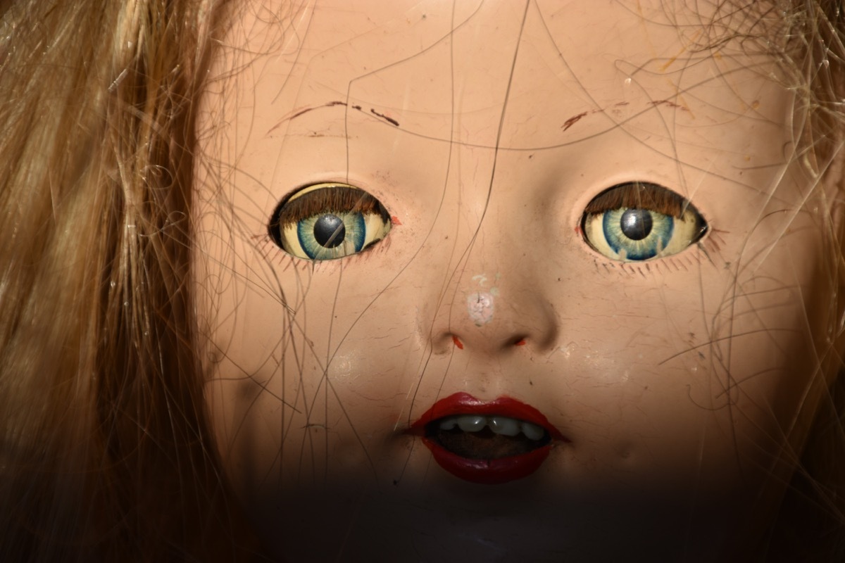 close up shot of a creepy doll face