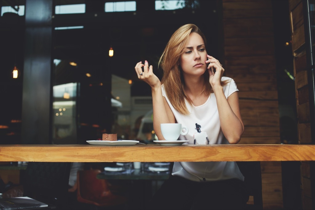 woman on phone Worst Things to Say to Customer Service