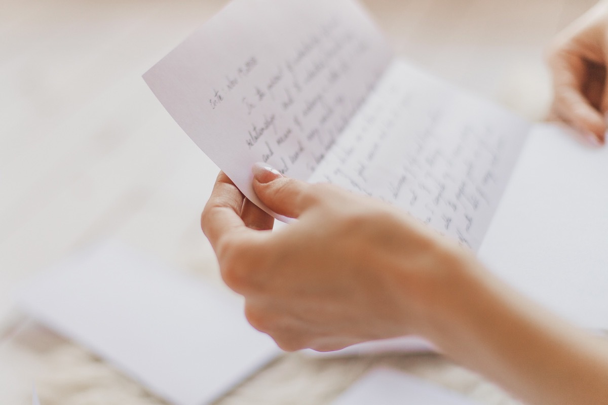 woman reading old love letters