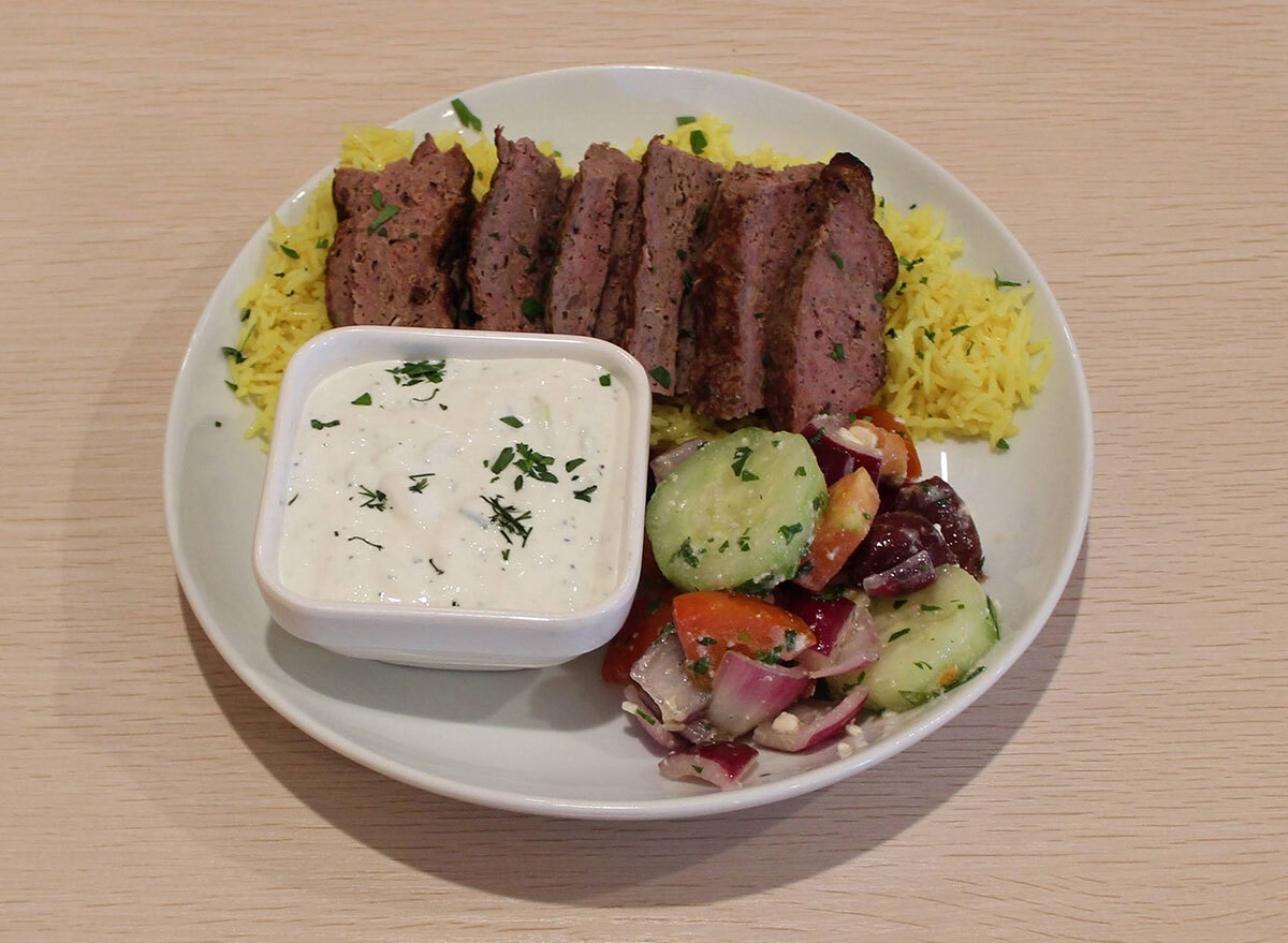 kebab platter with lamb greek salad and yogurt sauce