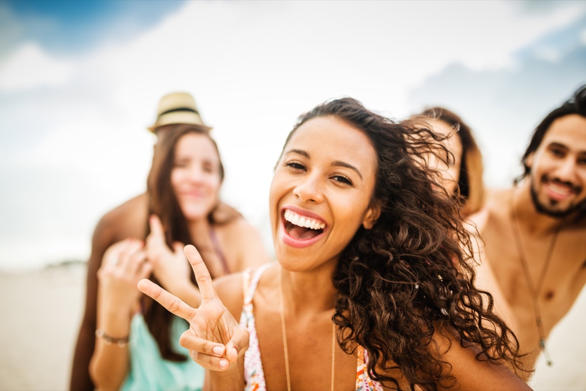 People dancing on the beach.