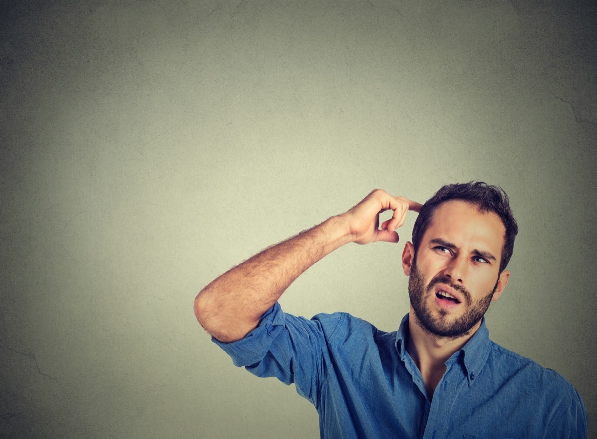 Man Scratching His Head