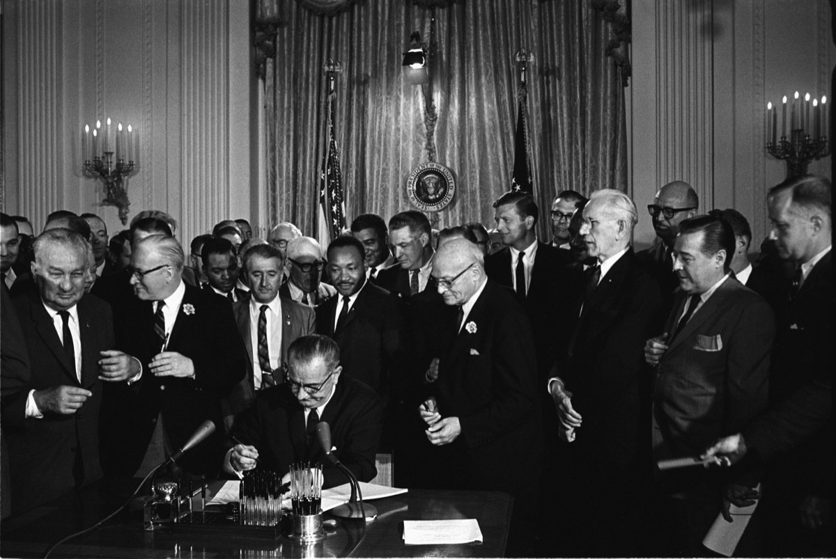 lyndon b johnson signing civil rights act, biggest event each year