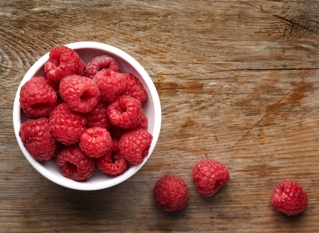 Raspberries in white bowl