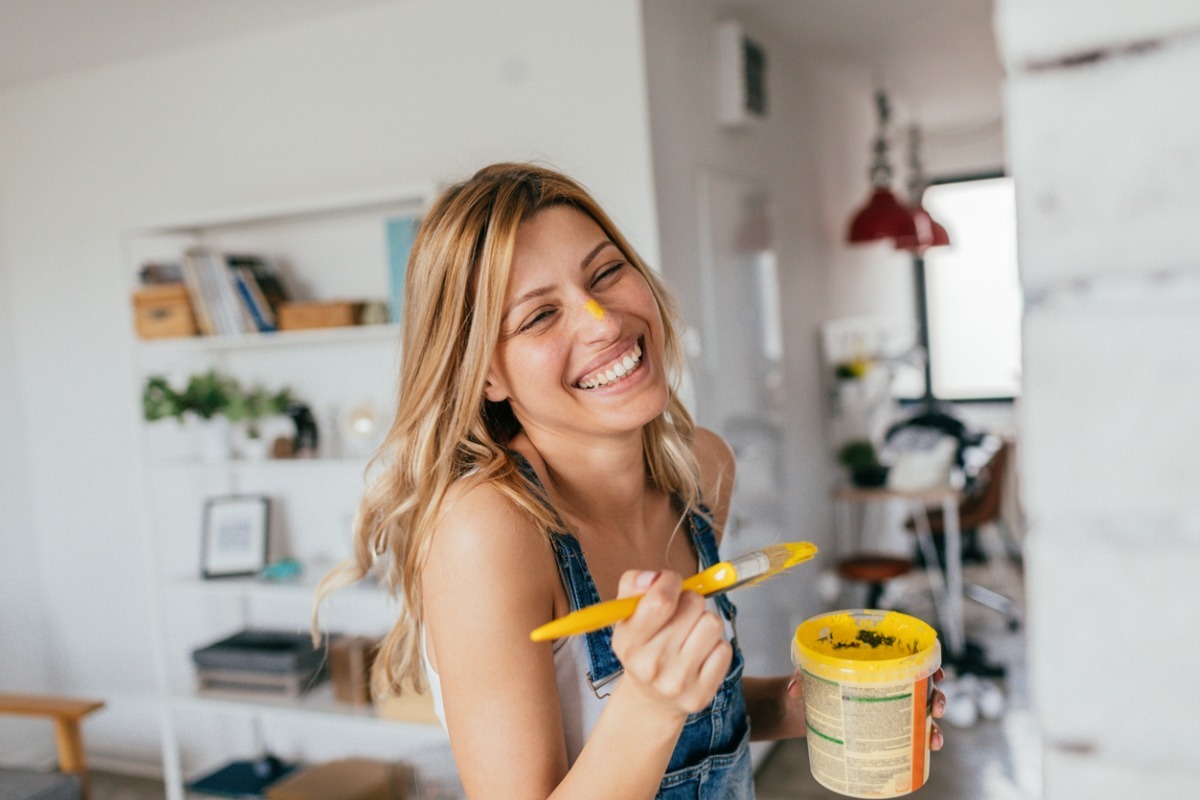 young woman painting