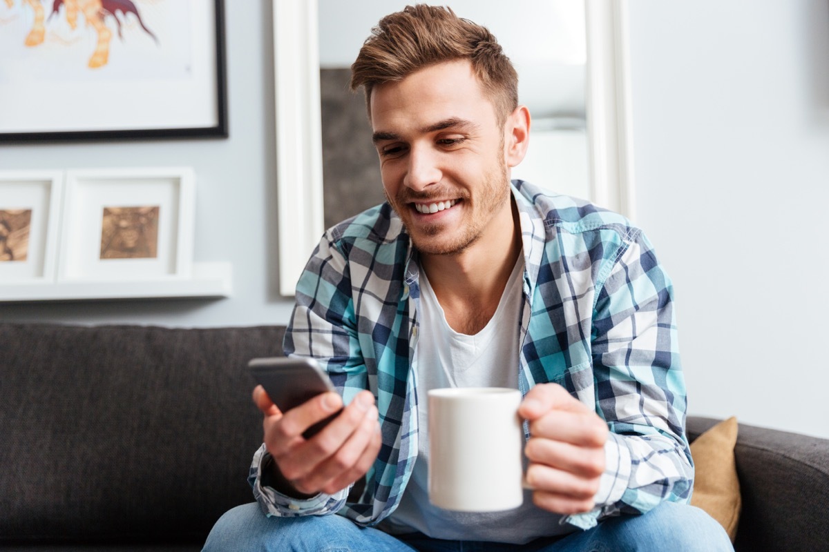 Man using a dating app on his phone