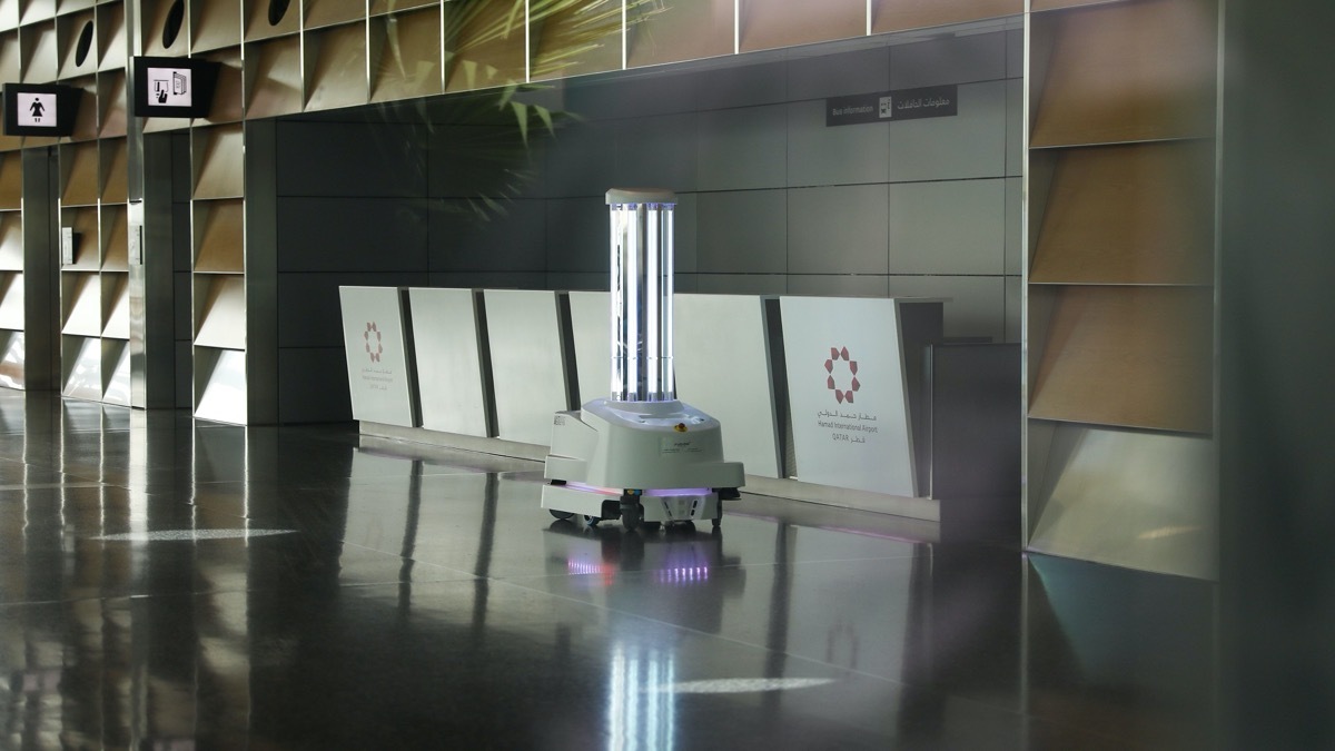 a disinfectant robot roams the terminals at Hamad International Airport in Doha