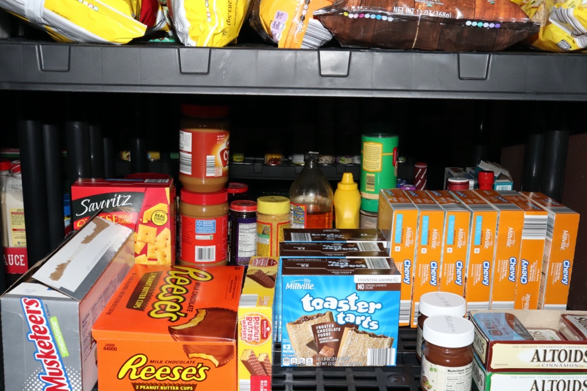 Prepper Shelves Basement Black Granola and Poptart Stockpile