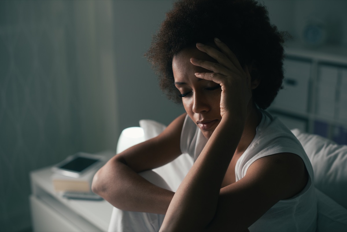 Woman can't sleep suffering from insomnia stressed