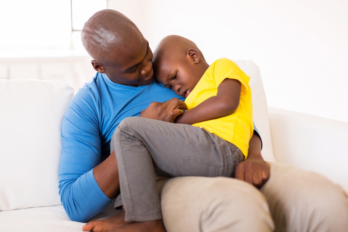 dad comforting son