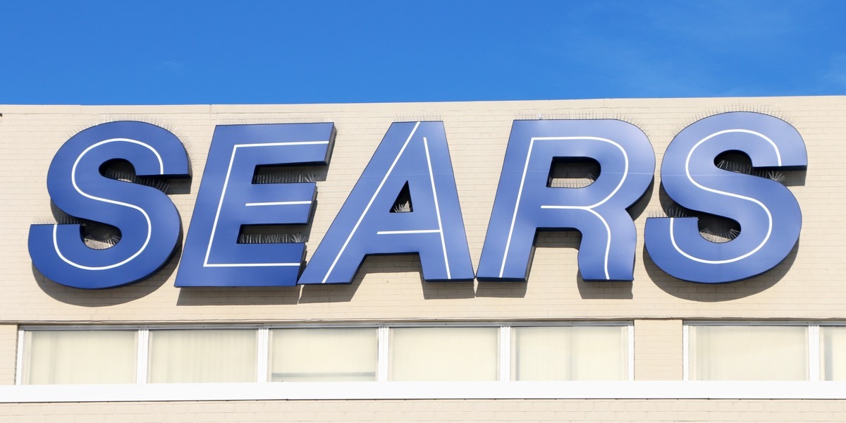 sign on the front of sears store