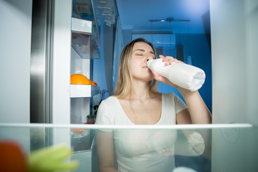 woman drinking milk from bottle, relationship white lies