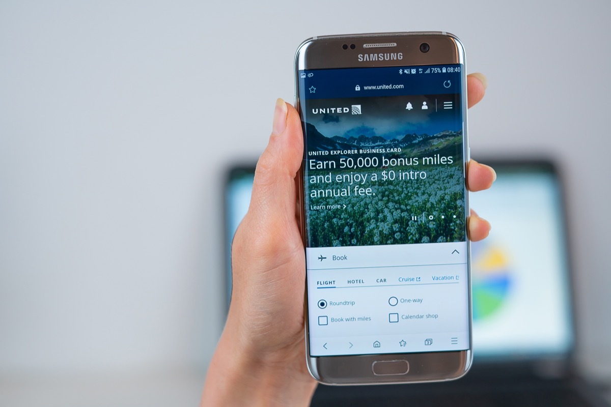 United airlines web site on mobile phone screen. Mobile version of United airlines company web page on smartphone. Official web page of United airlines.