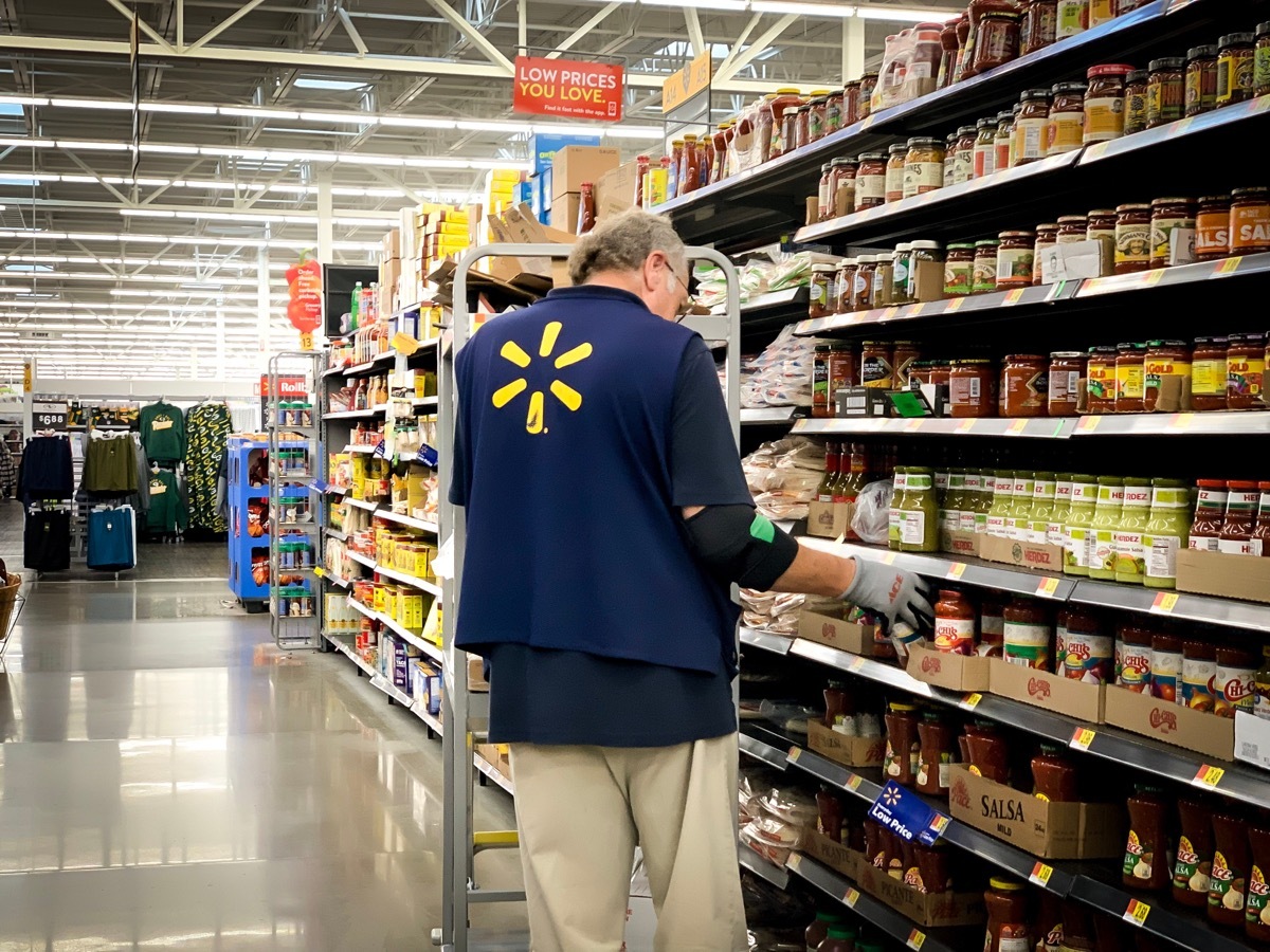 Walmart supermarket employees are sorting the products. Up the floor to allow customers to conveniently shop for products