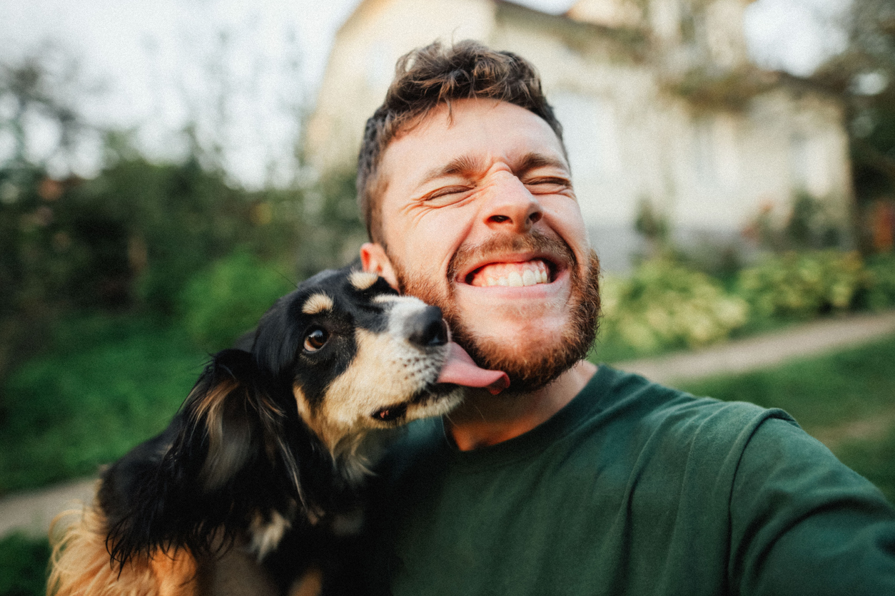 young man with dog