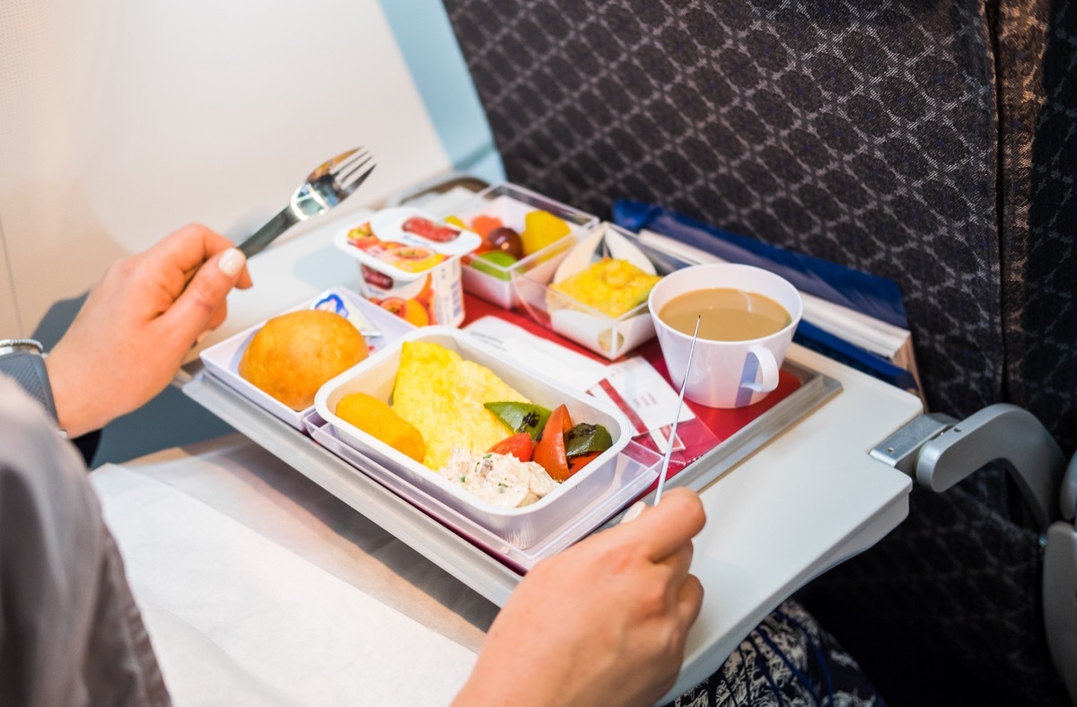 passenger eating food on airplane things that horrify flight attendants