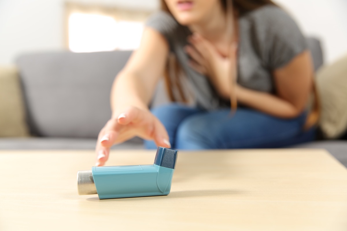 reaching for inhaler because of shortness of breath, heart warning signs