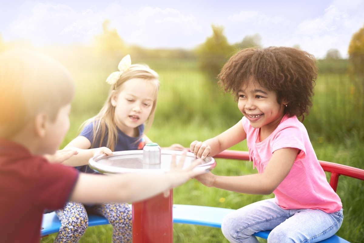 kids playing on playground equipment