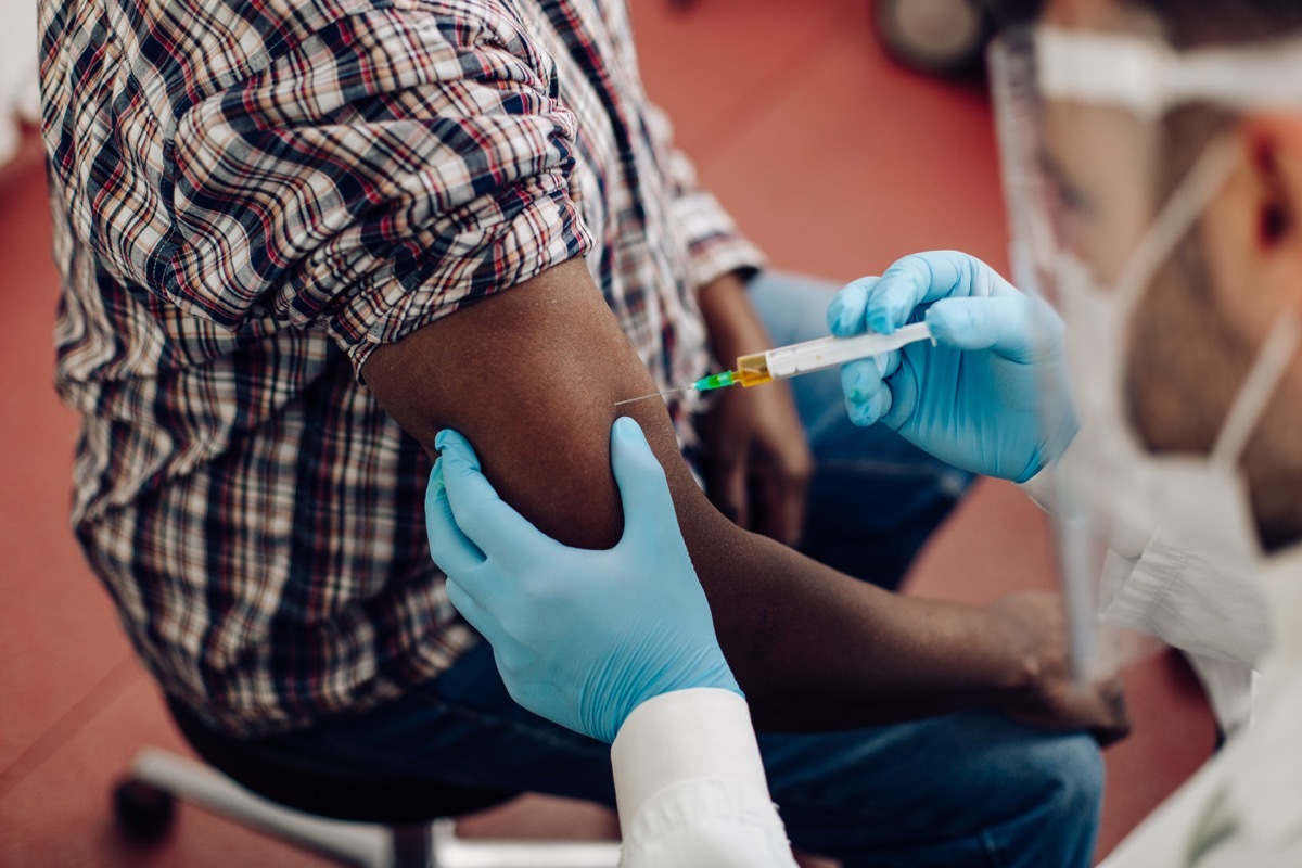 Doctor giving a Covid-19 vaccine