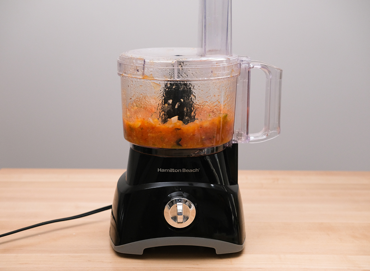 pulsing salsa in a food processor