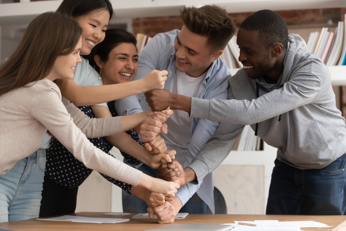 Happy Group Of Friends Doing Teambuilding